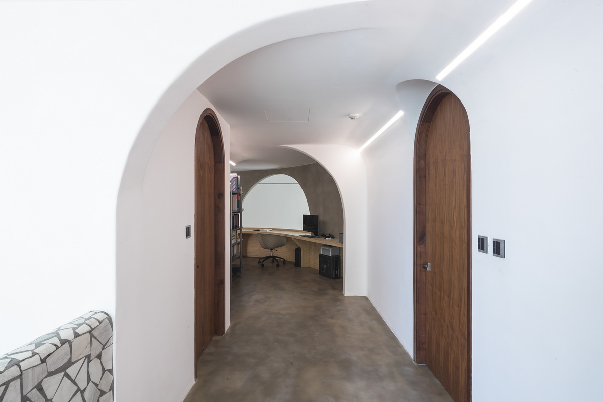 胡志明市水磨石公寓“Mài”，以弧形几何形状定义空间 / Whale Design Lab